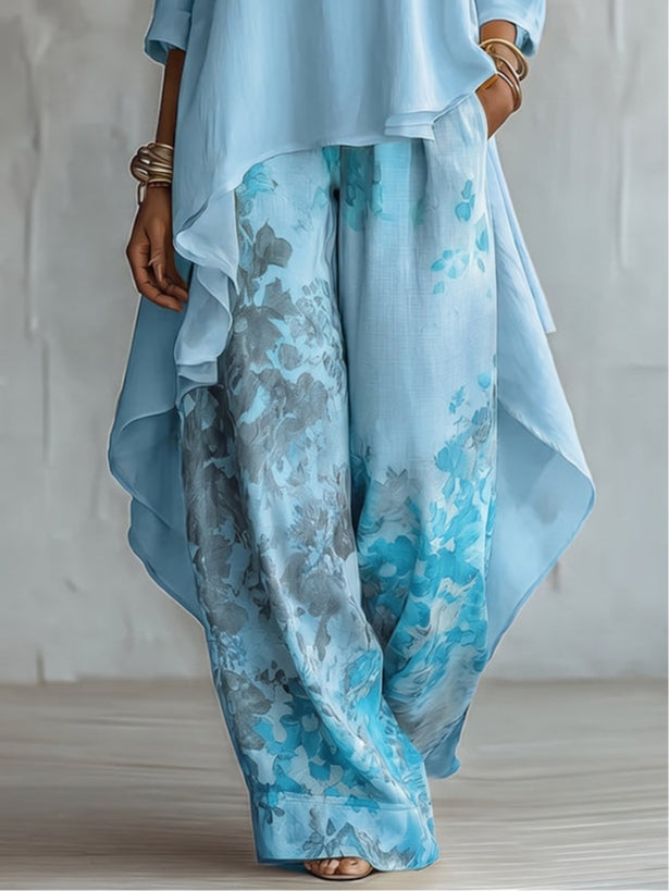 Ensemble haut bleu asymétrique et pantalon large à imprimé floral