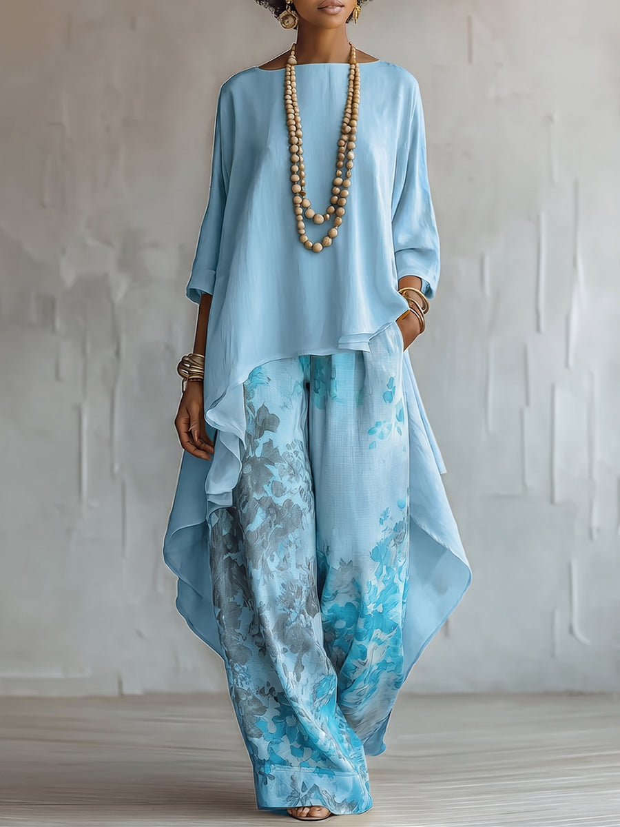 Ensemble haut bleu asymétrique et pantalon large à imprimé floral